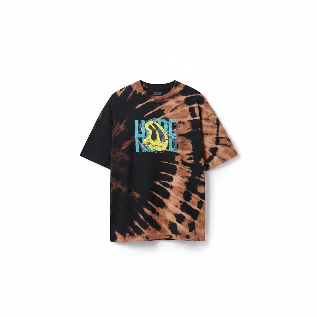 The Damn Denims oversized black and rust-brown tie-dye cotton t-shirt with a vibrant graphic print on a bearded man